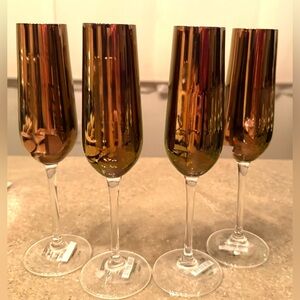 4 NWTs Pier 1 champagne flutes. Bronze, Slovakia. 6oz.   9.5”H